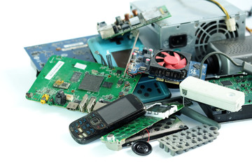 Pile of electronic waste, Computer circuit board, cellphone and orther broken or damage, on white...