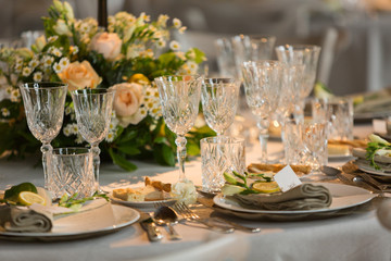 Formal dinner table setting with appetizers