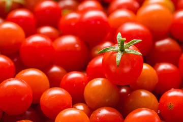Fresh Small Red Cherry Tomato. Shallow Depth Of Field. Close Up. Angle View. Background.
