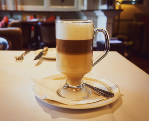 café latte, a coffee drink made with espresso and steamed milk served here in layers 
