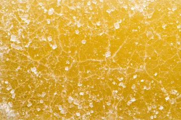 Gardinen Texture Of Yellow Marmalade With Sugar. Close Up. Macro. Top View. Background. © devaul