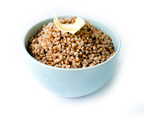 buckwheat in a bowl isolated on white