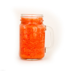 glass jar of red tomatoes