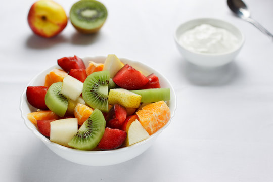 Healthy breakfast with fresh fruits and yogurt.
