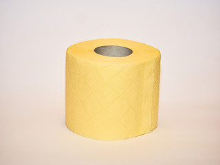 toilet paper, tissue yellow paper roll isolated on white background