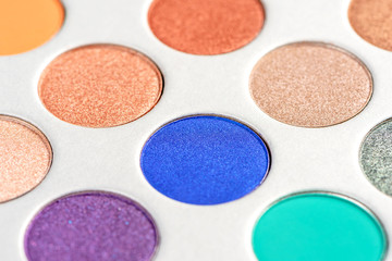 Colorful eye shadows palette. Makeup background.