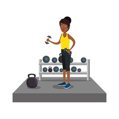 young woman lifting dumbbell