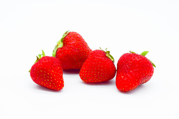 whole strawberries isolated on white background