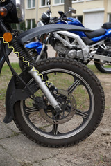 Anti-theft disc brake rotor (the clamp) along with the cable. Motorcycle.