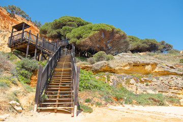 A wooden staircase to the beach in Algarve, Portugal