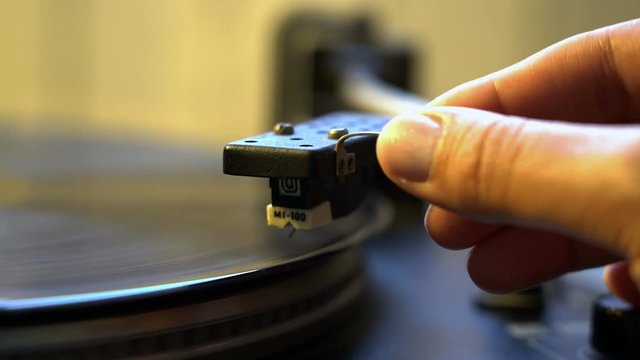 Cinemagraph Loop Vintage Vinyl Turntable Record Player female hand holding niddle