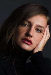 Fototapeta premium Glamour portrait of beautiful girl model with makeup and romantic hairstyle. Fashion shiny highlighter on skin, sexy gloss lips make-up 