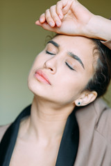 Fototapeta premium Emotional young girl, laughing and smiling. Grimaces at the camera, posing. Portraits with emotions. Russian girl