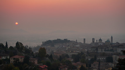 Bergamo. One of the beautiful city in Italy. Morning landscape at the old town from Saint Vigilio hill during fall season