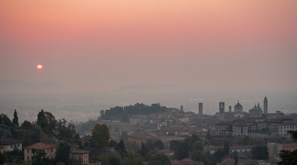 Bergamo. One of the beautiful city in Italy. Morning landscape at the old town from Saint Vigilio hill during fall season