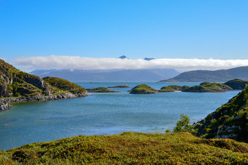 Fototapeta na wymiar Landscape of a large fjord with small green islands on the Nordic sea, Lofoten islands, norway.