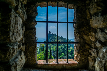 view from tower window on medieval castle Torre Cesta on top of the mountain  Monte Titano, old city of republic of san marino