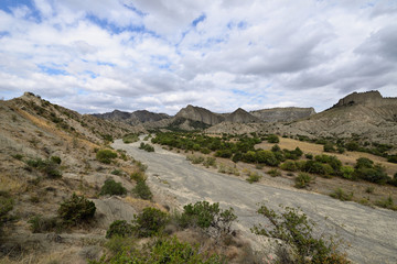Fototapeta premium Georgia, Vashlovani National Park the driest deserts. Panoramic view of mountains.