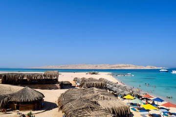 View over Mahmya island, beautiful paradise in red sea, turquoise ocean, umbrellas at the sandy...