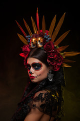 Creative image of Sugar Skull. Neon makeup for Halloween or Dia De Mertos holiday.