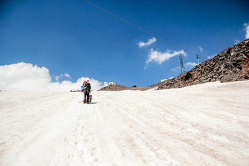 man on top of mountain