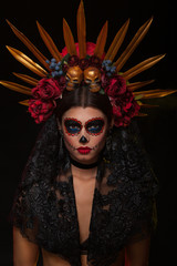 Creative image of Sugar Skull. Neon makeup for Halloween or Dia De Mertos holiday.