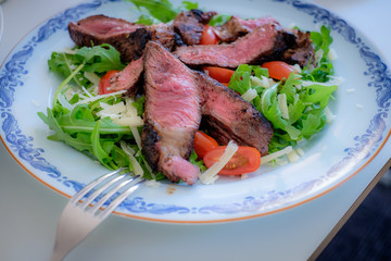 Beef with salad on a plate