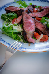 Beef with salad on a plate