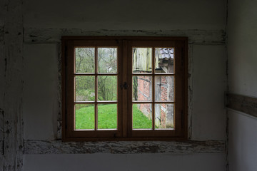 Fototapeta na wymiar The window of an old farmhouse, inside