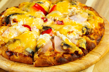 Pizza with mushrooms and ham