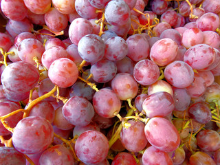 organic juicy red grapes top view closeup, natural background