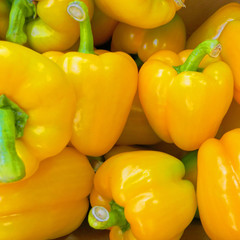 yellow bell peppers top view close up, natural background