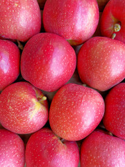 fresh juicy red apples top view closeup, natural background