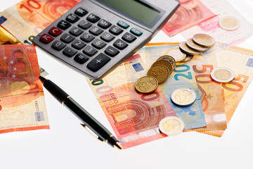 taschenrechner geld und stift