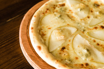 delicious pizza with meat, cheese and mushrooms	