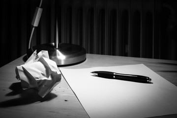 pen and paper at night