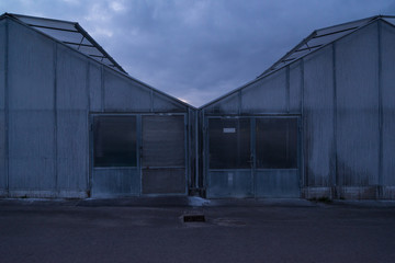 Fototapeta na wymiar exterior of disused greenhouse
