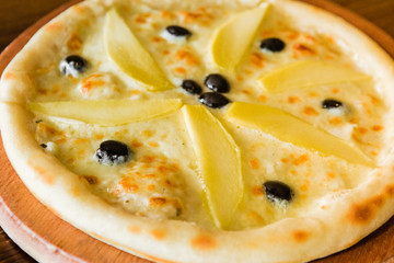 delicious pizza with meat, cheese and mushrooms	