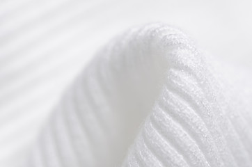 White sweater fabric textile material texture macro blur background