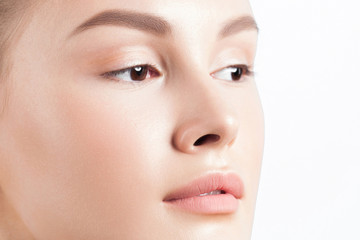 Fototapeta premium Young beautiful woman with clean perfect skin close-up