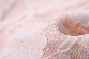 Peach pink fabric textile material texture openwork mesh macro blur background