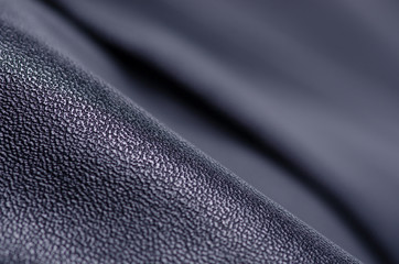 Black leather fabric textile material texture macro blur background