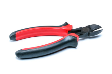 Obraz premium Side cutters with black and red isolated handles on white background. Tool isolated on white with clipping path.