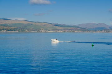 Small Speed Boat on the River Clyde in October Sunshine