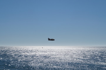 Hydroplane over the sea in the sun