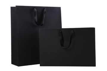 Black shopping bags isolated on white background