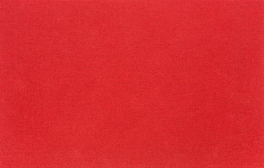 The texture of the canvas fabric is red. Horizontal abstract blank background for design ideas.