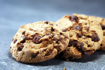 Chocolate cookies on rustic table. Chocolate chip cookies shot