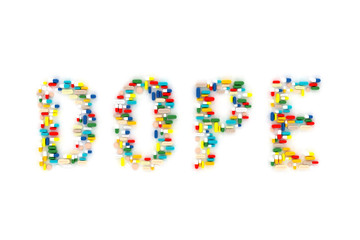 a lot of pills stacked in the word dope on a white background. 3d illustration