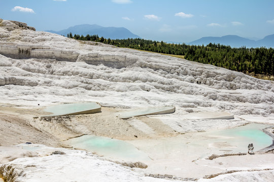 View on white . slopes and thermal springs and travertines of Pamukkale
